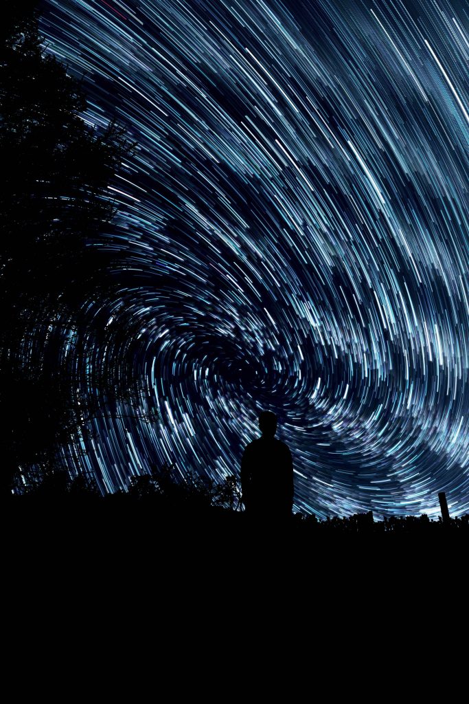 swirling stars like data around a person