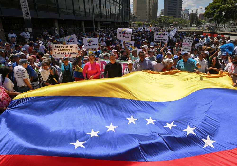 POSTPONED Venezuela 2024 A Democratic Opportunity Atlantic Council   2023 05 01T193609Z 1227502045 RC2QP0A9QBU8 RTRMADP 3 MAY DAY VENEZUELA Scaled E1690922752574 1000x700 