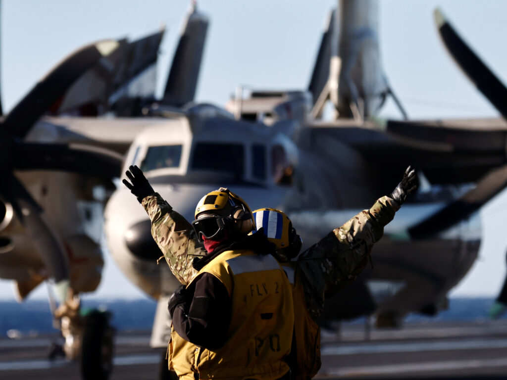 US Navy sailors operate onboard aircraft carrier USS Harry S. Truman, in the Adriatic Sea, February 2, 2022. The Truman strike group is operating under NATO command and control along with several other NATO allies for coordinated maritime maneuvers, anti-submarine warfare training and long-range training.
