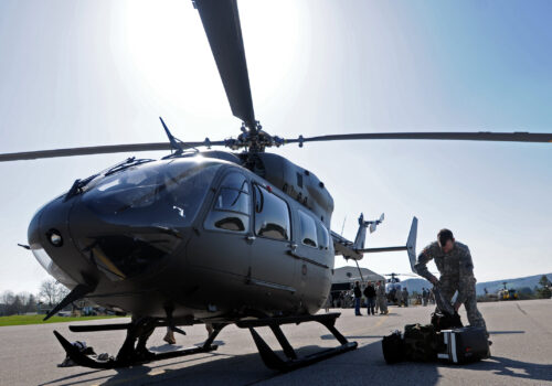Chief Warrant Officer Richard Infusino, a Falcon Team pilot, packs up his gear after landing one of five new UH-72A Lakota light utility helicopters at Hohenfels Army Airfield April 21. The new helicopters will replace the post's aging fleet of UH-1 ... (Photo Credit: U.S. Army)
